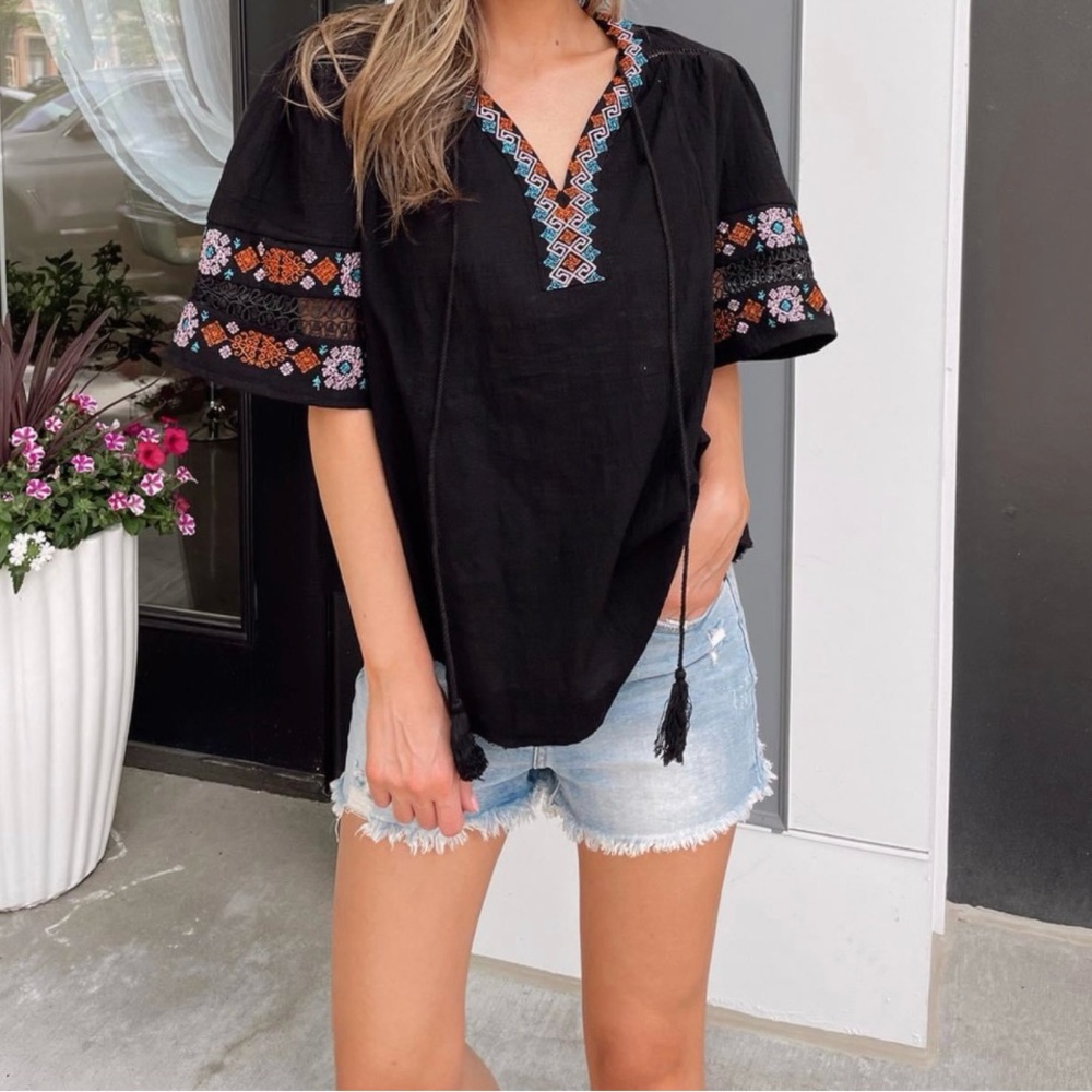 Embroidered Boho Boutique Top — Black V‑Neck Puff Sleeve Fringe Detail Blouse